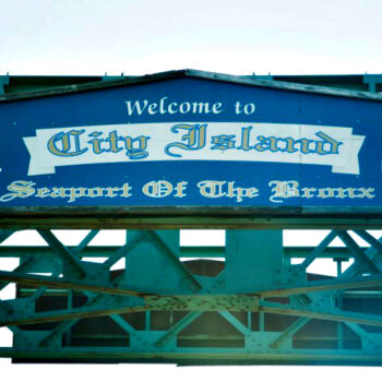 This is an image of a Welcome To City Island Sign