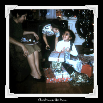 This is an image of Ruth, Brother and Mother at Christmas in the early 1960s
