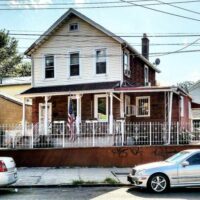 This is an image of a Corona House With American Flag