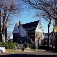 This is an image of a Country Club Three Story House