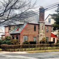 This is an image of a Flushing Tudor Style Home