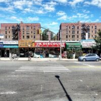 This is an image of Flushing Storefronts