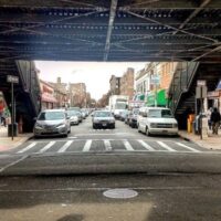 This is an image of Jackson Heights Under The El