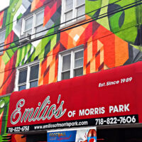 This is an image of Morris Park Emilios Pizzeria With Colorful Mural