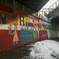 This is an image of the Parkchester Viaduct Mural Depicing Bronx History