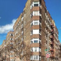 This is an image of a Pelham Parkway Triangular Apartment Building