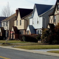 This is an image of Whitestone House With American Flag