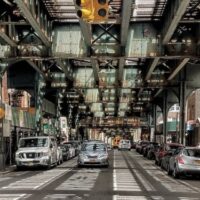 This is an image of Woodside Under the El